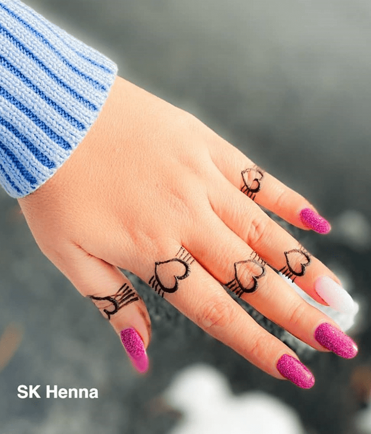 Ideal heart Henna on Back hand