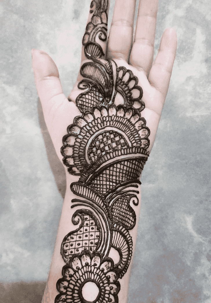 Dazzling Raksha Bandhan Henna Design on Back Hand