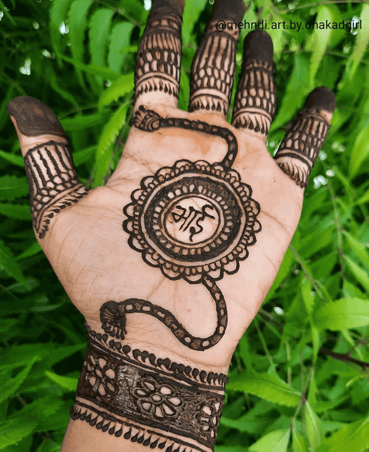 Marvelous Raksha Bandhan Henna Design on Back Hand