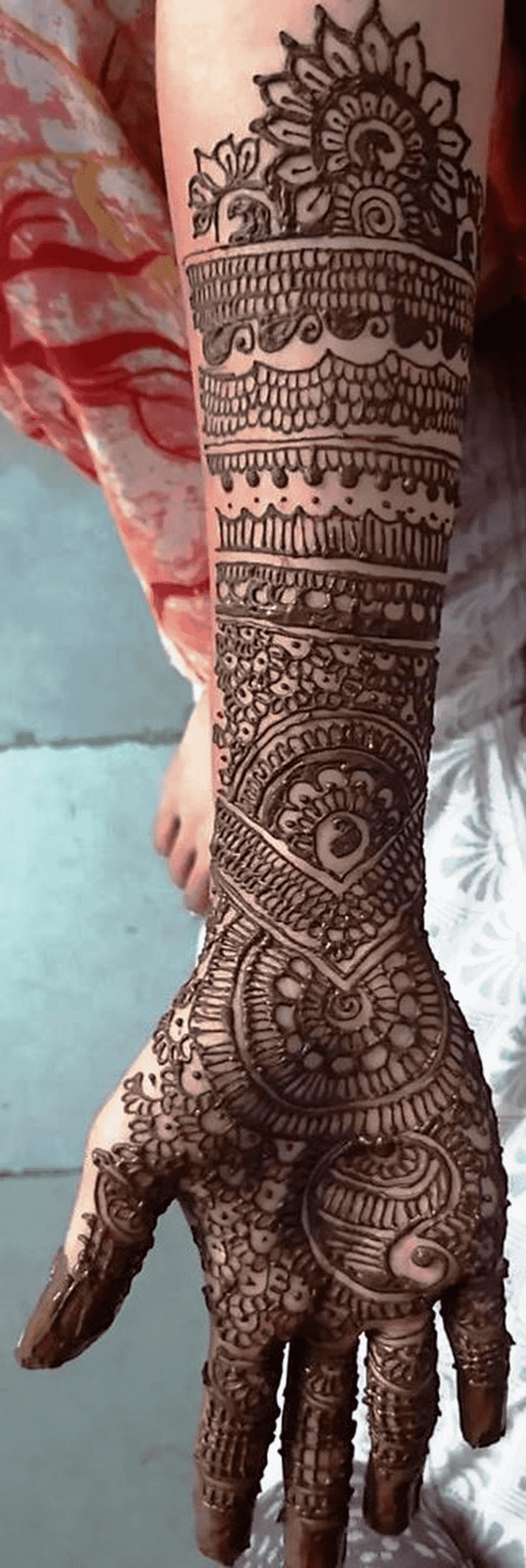 Dazzling Traditional Full Arm Henna Design